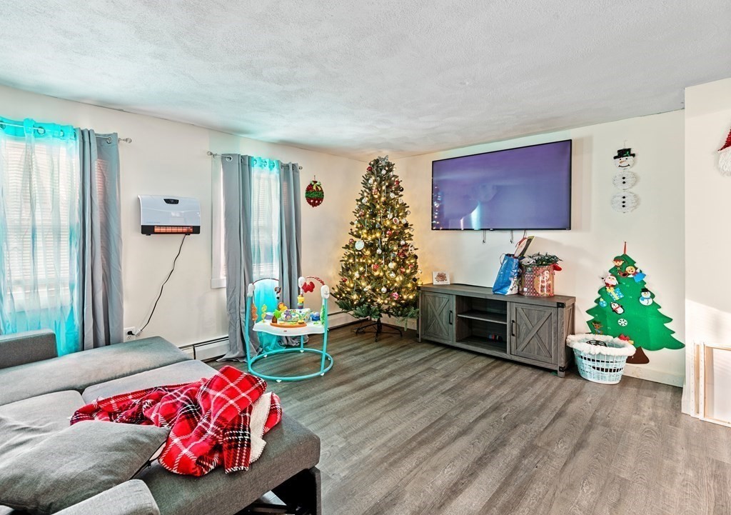 19 Myrtle Avenue Webster, MA 01570 - Photo 7 of 42 a bedroom with furniture and a bed