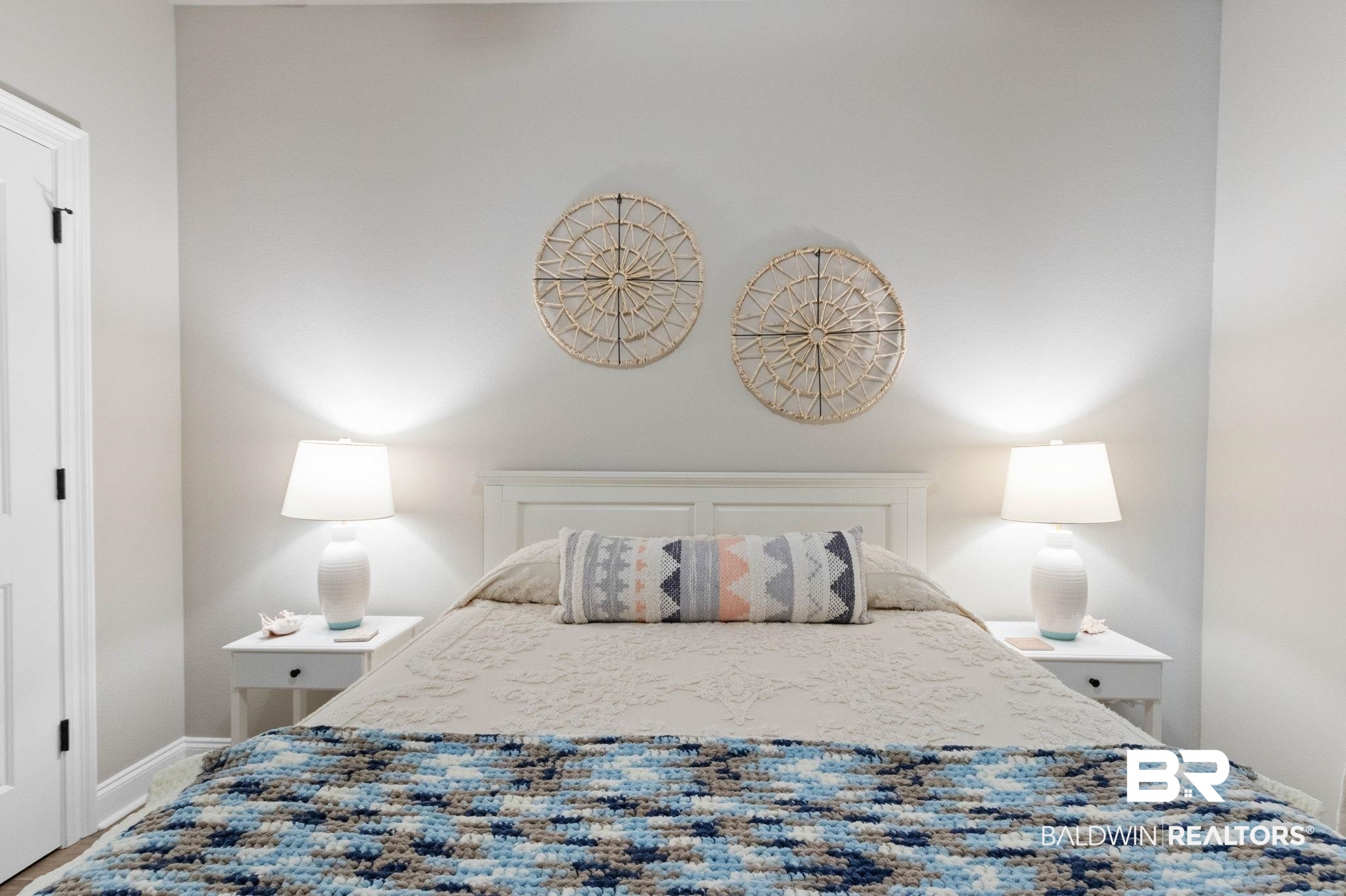 22244 Hibiscus Circle Foley, AL 36535 - Photo 39 of 51 Bedroom featuring a white paneled headboard and two white nightstands with integrated drawer storage