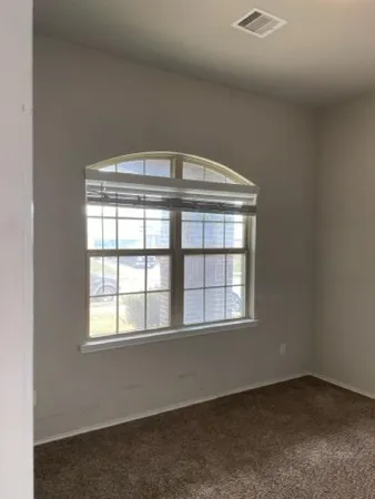 an empty room with a window