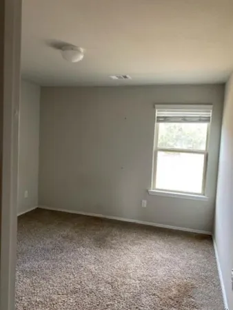 an empty room with a window