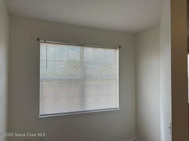 a view of a small space with a window