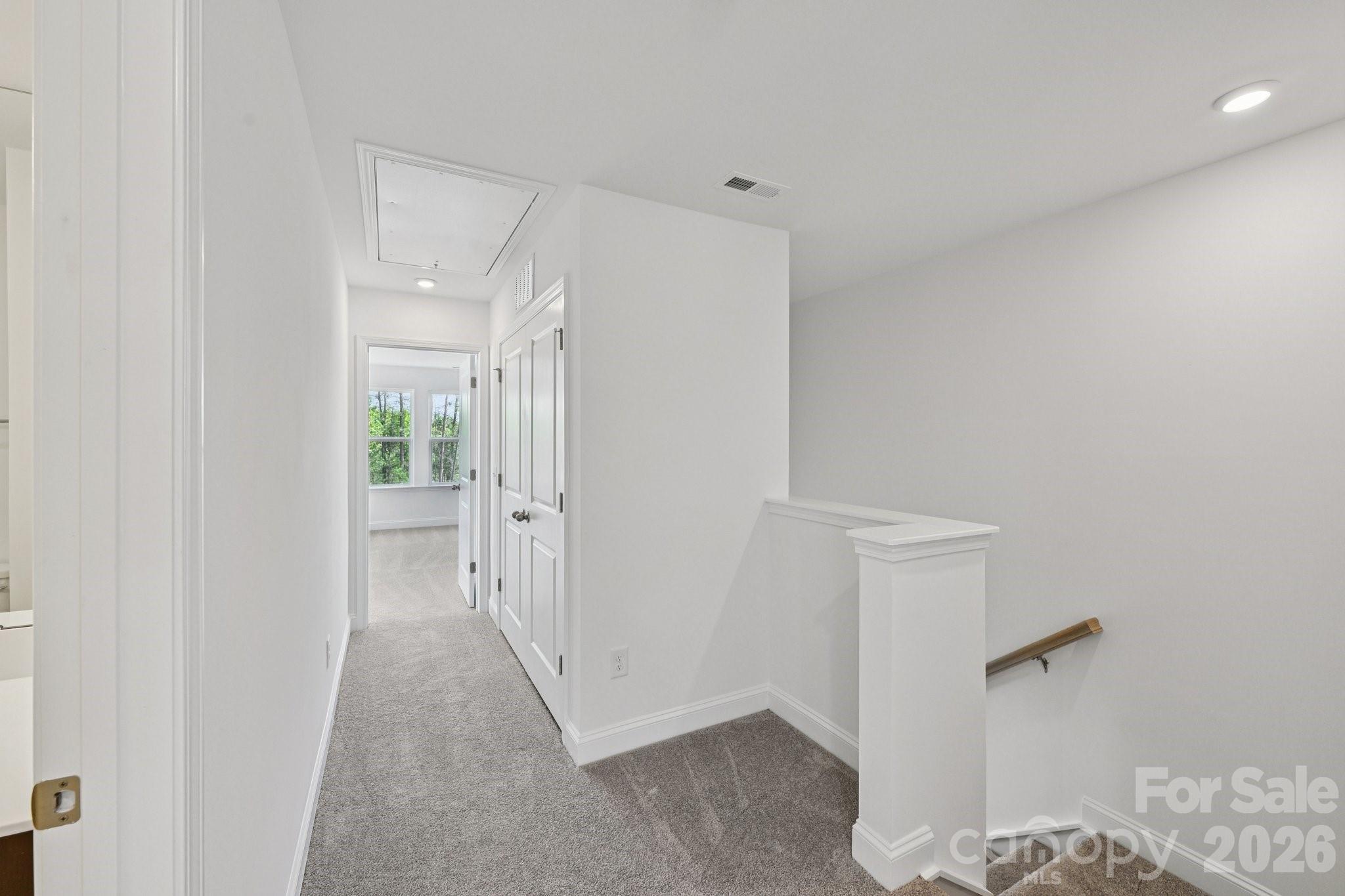 7635 Ethora Way Charlotte, NC 28216 - Photo 19 of 37 a view of a room with white walls
