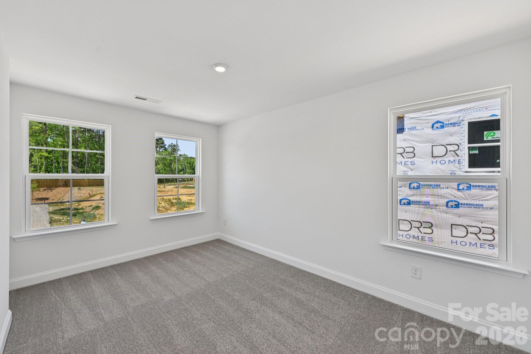 7635 Ethora Way Charlotte, NC 28216 - Photo 20 of 37 an empty room with window