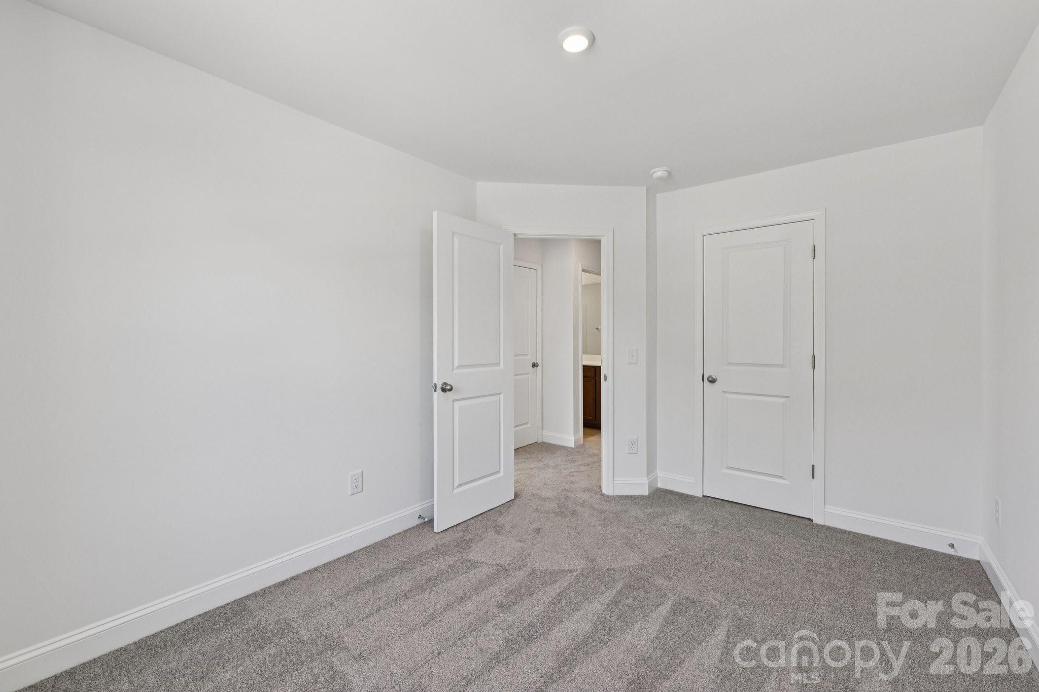 7635 Ethora Way Charlotte, NC 28216 - Photo 23 of 37 a view of an empty room