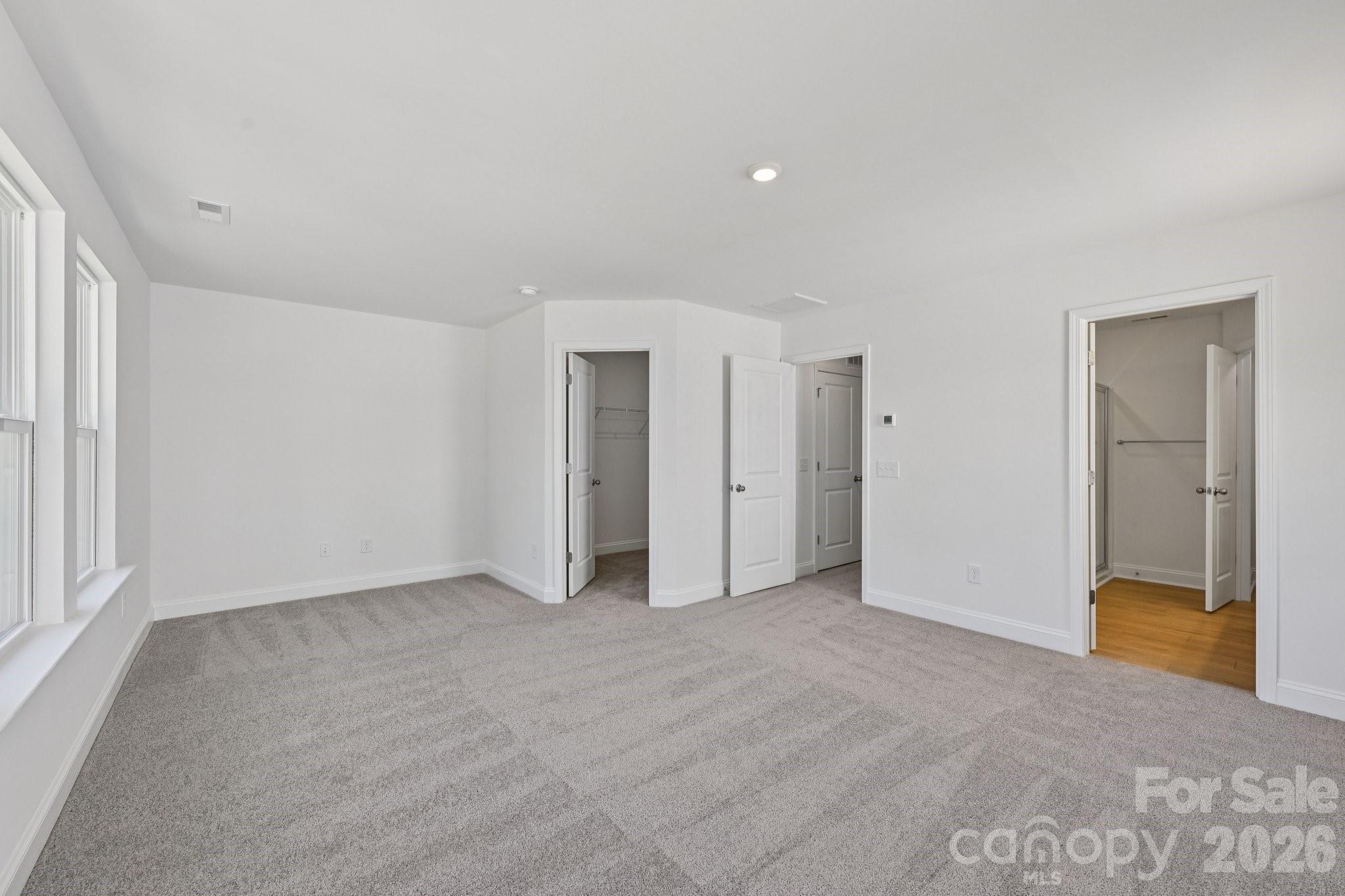 7635 Ethora Way Charlotte, NC 28216 - Photo 26 of 37 a view of an empty room with a window