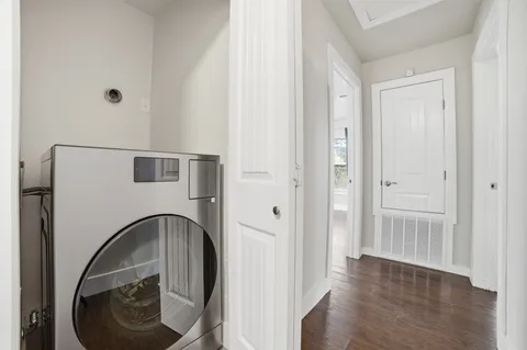 a close view of a utility room with washer and dryer