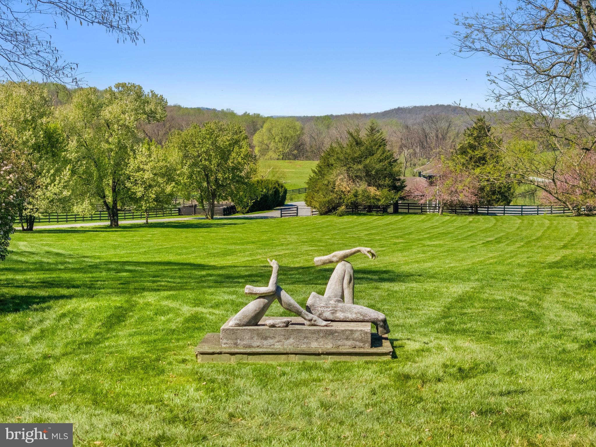 3252 Winchester Road Delaplane, VA 20144 - Photo 66 of 74 a view of a golf course with a garden