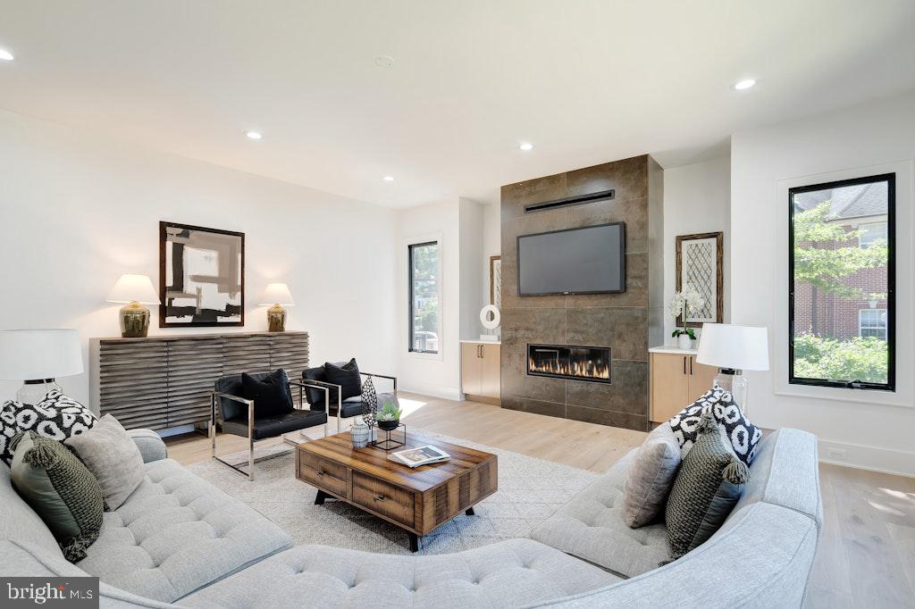 5225 Little Falls Road Arlington, VA 22207 - Photo 13 of 60 a living room with furniture and a fireplace