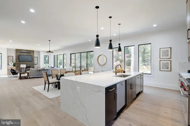 a view of an entryway with wooden floor