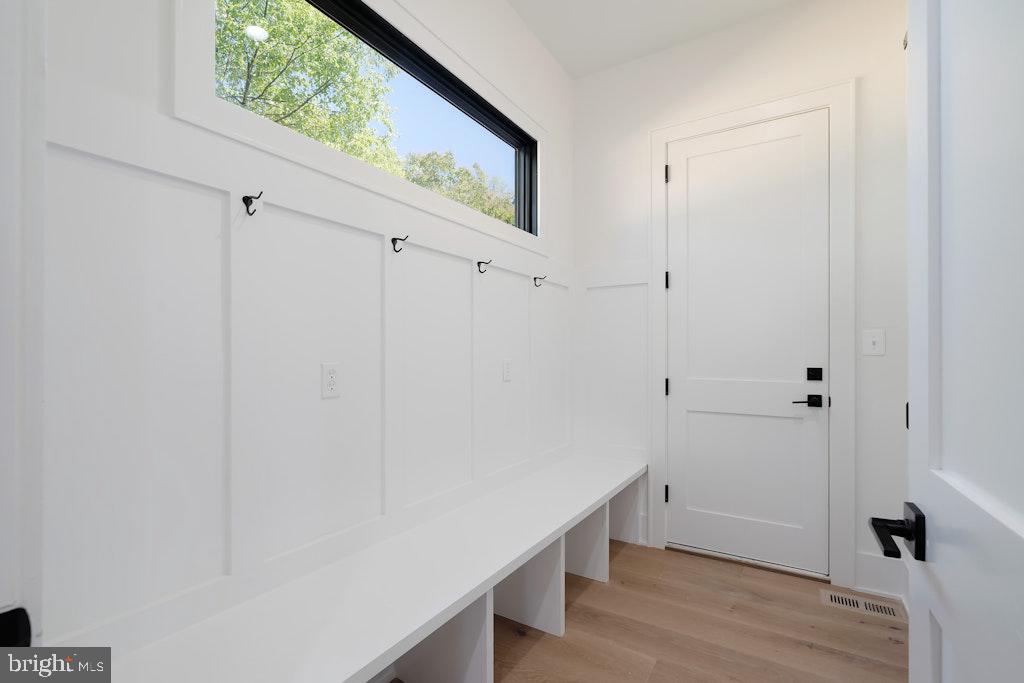 5225 Little Falls Road Arlington, VA 22207 - Photo 23 of 60 a view of an entryway with wooden floor