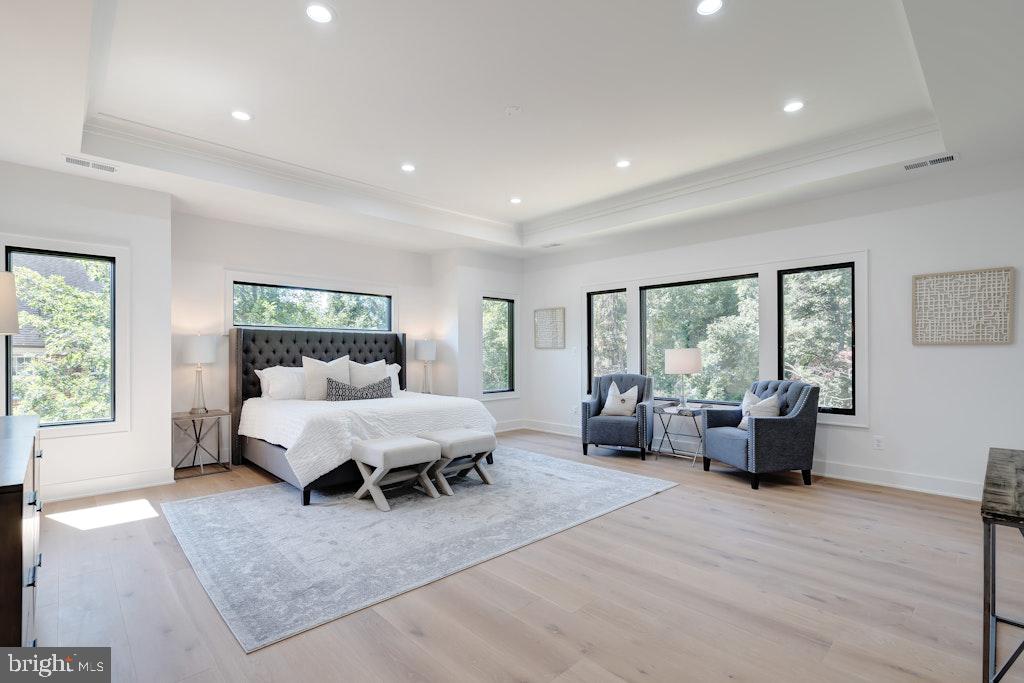 5225 Little Falls Road Arlington, VA 22207 - Photo 30 of 60 a living room with furniture floor to ceiling window and a table