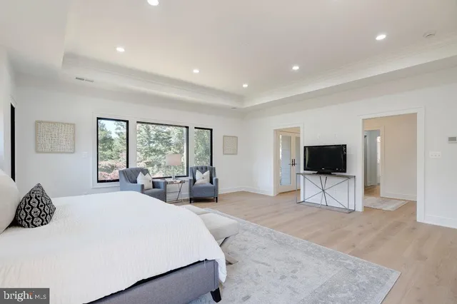 a white bath tub sitting in a bathroom
