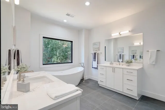 a kitchen with cabinets and sink