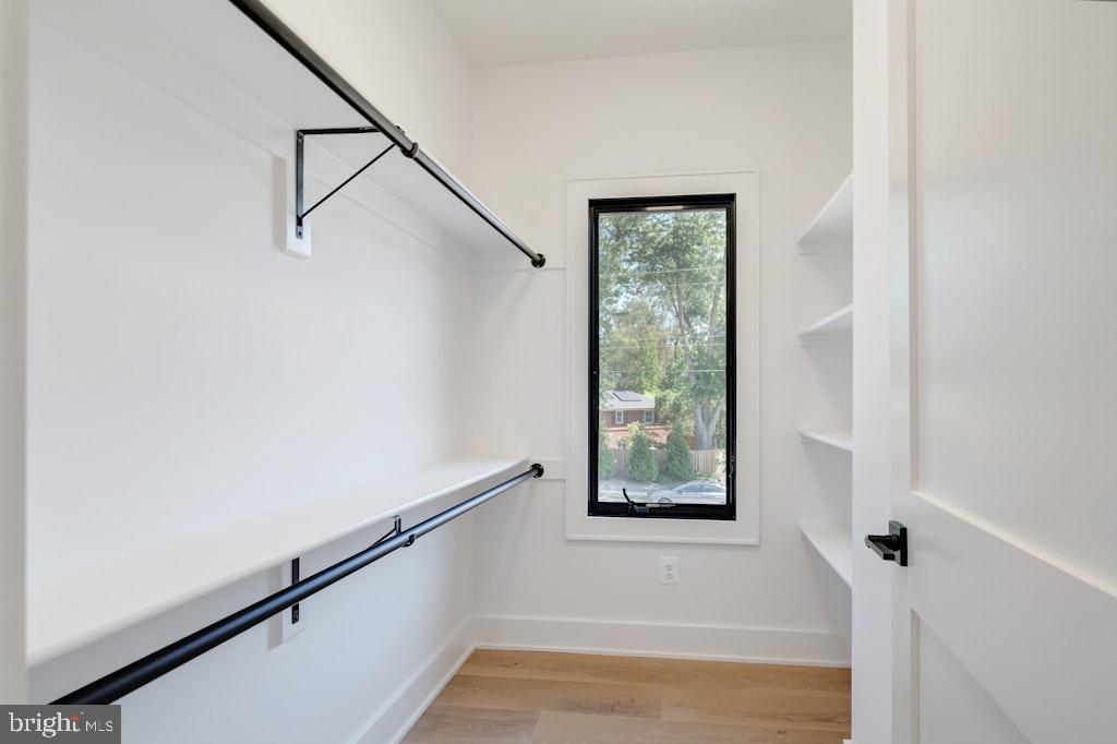 5225 Little Falls Road Arlington, VA 22207 - Photo 42 of 60 a bathroom with a window and a shower