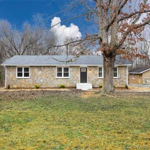 1814 Lockett Road Rice, VA 23966 - Photo 1 of 21 a front view of a house with a garden