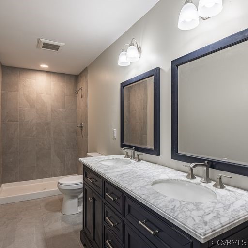 1814 Lockett Road Rice, VA 23966 - Photo 13 of 21 a bathroom with a granite countertop sink a toilet and a mirror