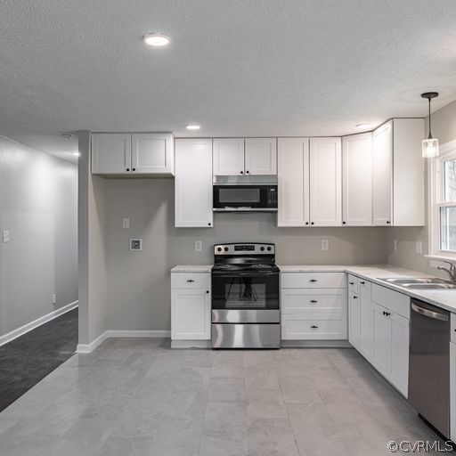 1814 Lockett Road Rice, VA 23966 - Photo 8 of 21 a kitchen with cabinets and stainless steel appliances