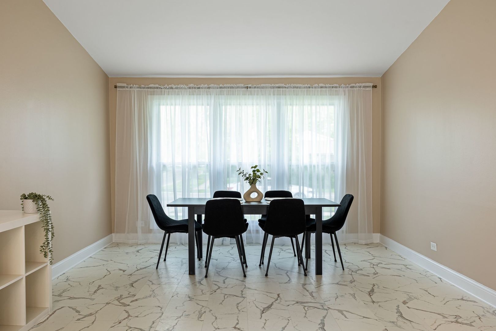 2117 Grouse Lane Rolling Meadows, IL 60008 - Photo 8 of 25 a view of a dining room with furniture and window