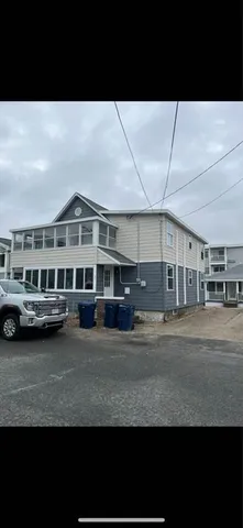 a view of swimming pool with outdoor seating