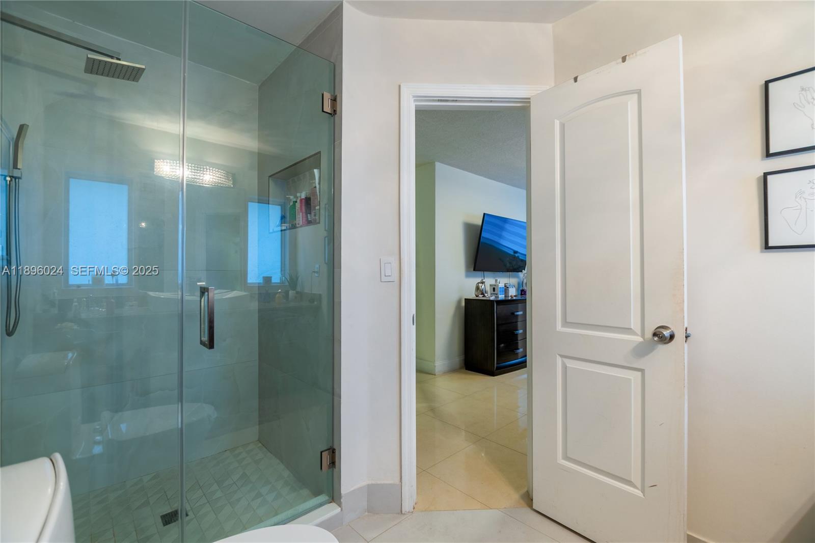 10820 Southwest 125th Street Miami, FL 33176 - Photo 23 of 46 a bathroom with a shower and a sink