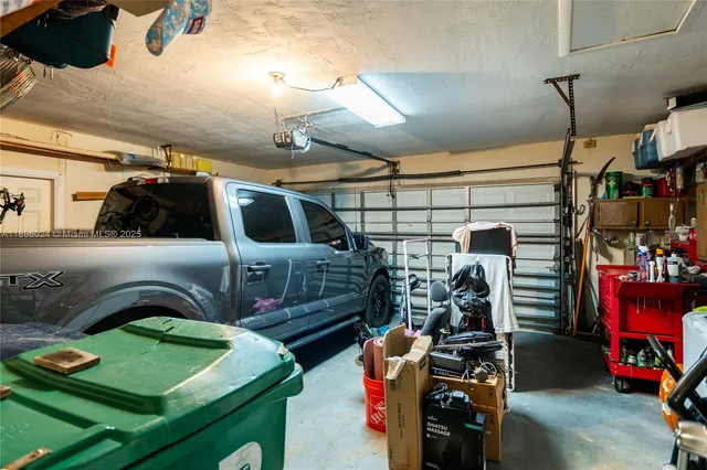 a view of a patio with a table chairs and a patio