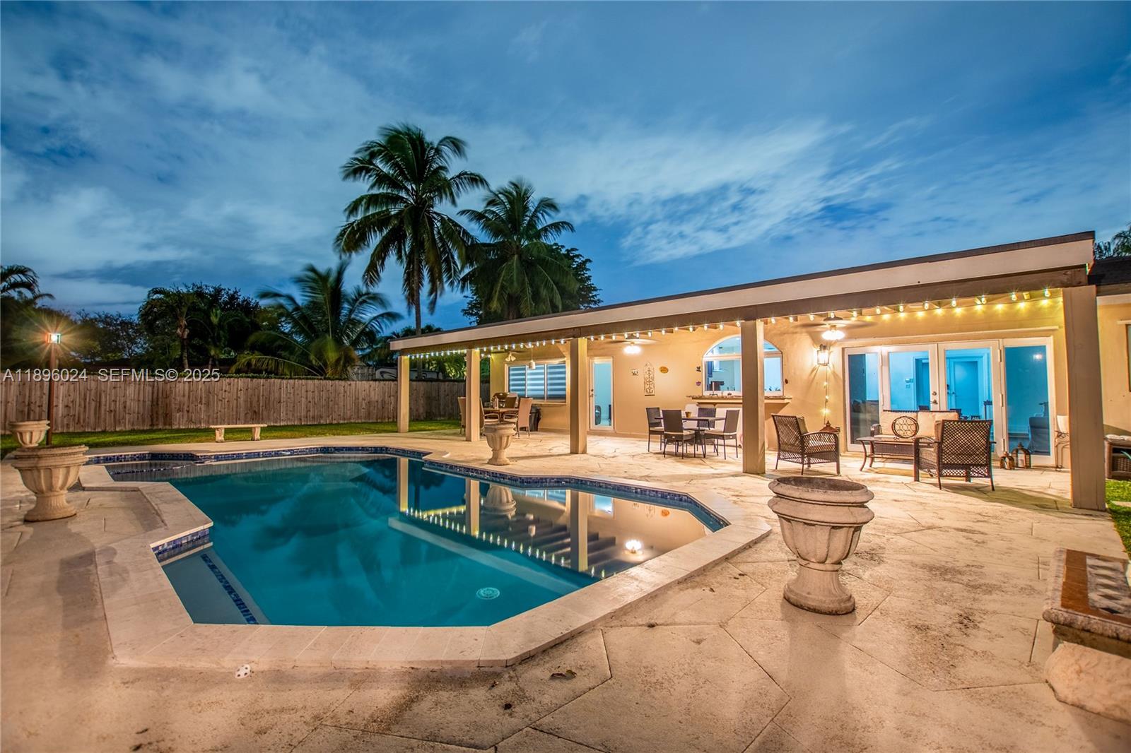 10820 Southwest 125th Street Miami, FL 33176 - Photo 36 of 46 a view of a swimming pool with a patio
