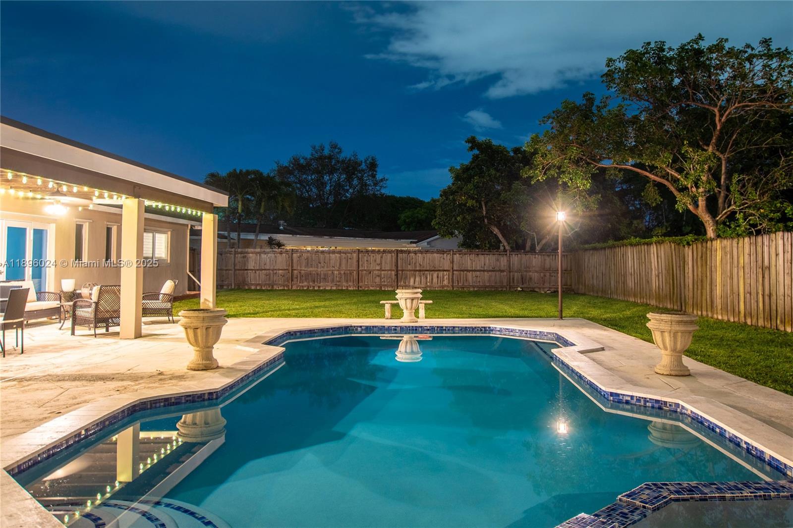 10820 Southwest 125th Street Miami, FL 33176 - Photo 39 of 46 a view of a swimming pool with lounge chair