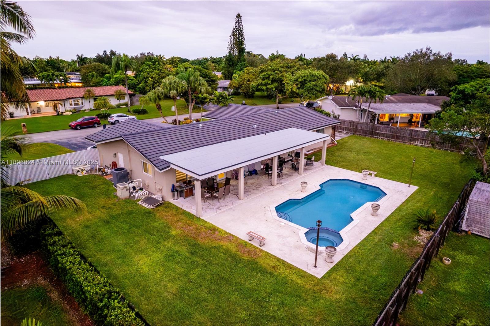 10820 Southwest 125th Street Miami, FL 33176 - Photo 43 of 46 an aerial view of a house with swimming pool garden and patio