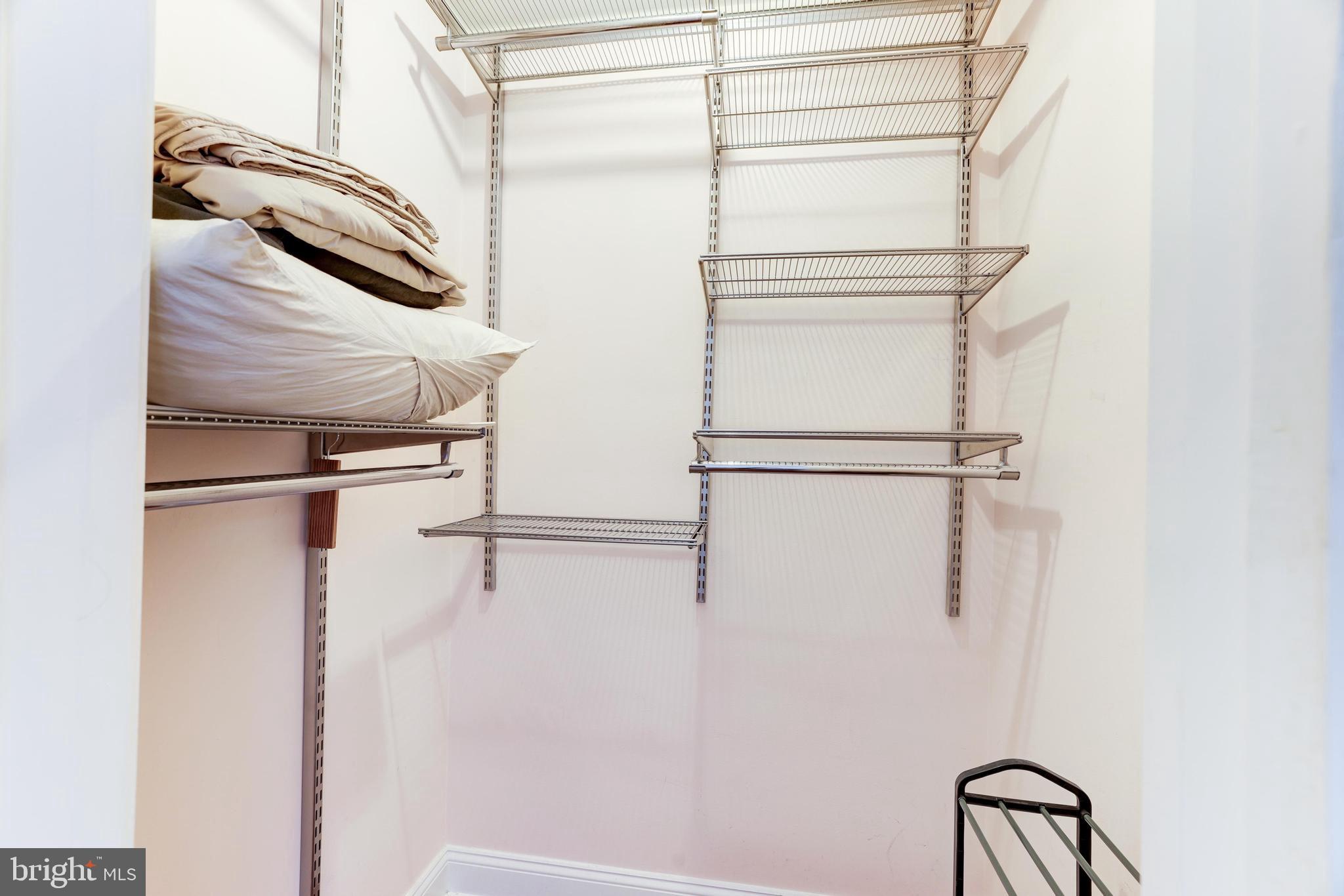 2004 3rd Street Northeast, Unit 201 Washington, DC 20002 - Photo 20 of 35 a view of walk in closet with empty racks
