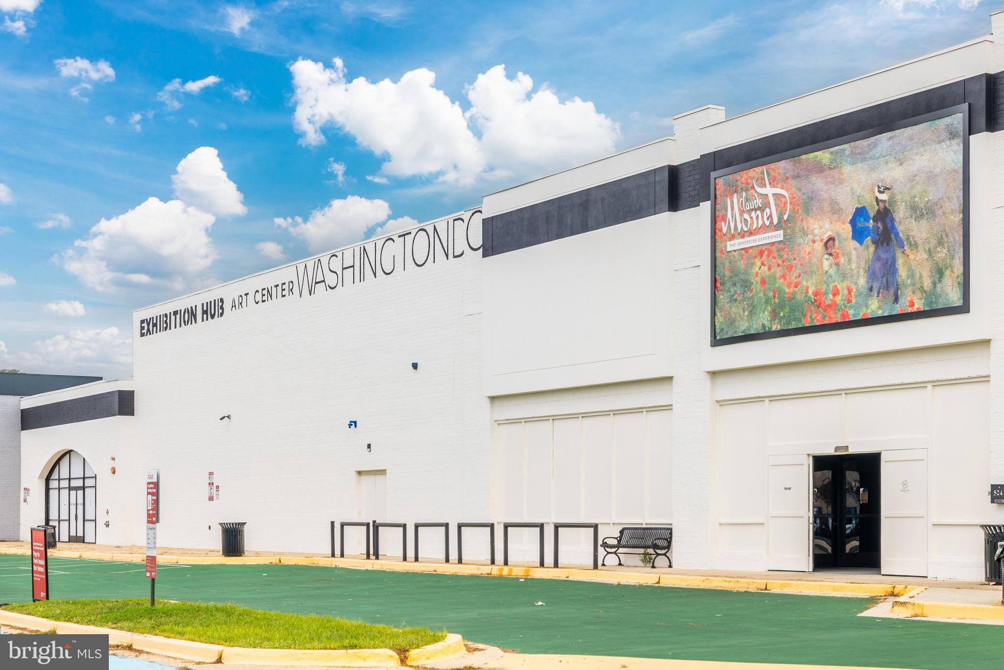 2004 3rd Street Northeast, Unit 201 Washington, DC 20002 - Photo 31 of 35 a view of a white house with a yard