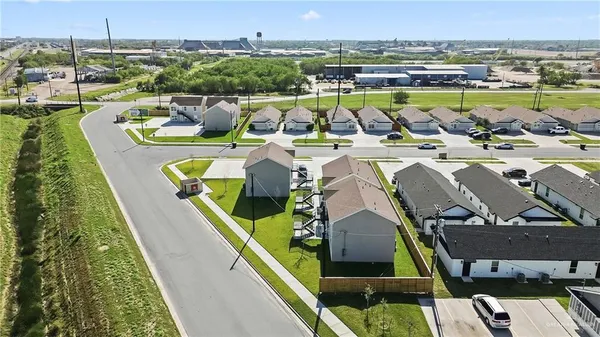 an aerial view of a house with a garden