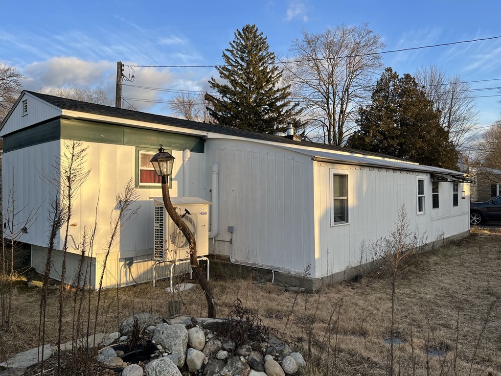 39 Mobile Home Way Springfield, MA 01119 - Photo 2 of 11 a view of a house with backyard