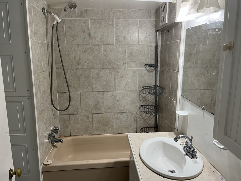 39 Mobile Home Way Springfield, MA 01119 - Photo 6 of 11 a bathroom with a sink and a mirror