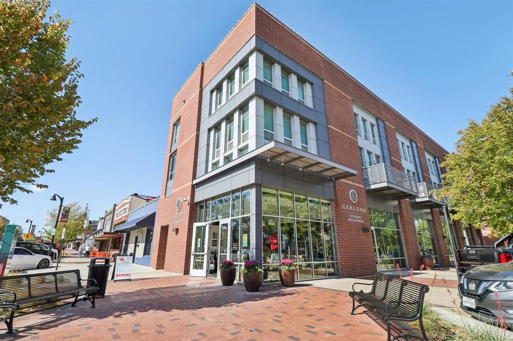 113 West State Street Garland, TX 75040 - Photo 29 of 31 a view of a brick building with many windows