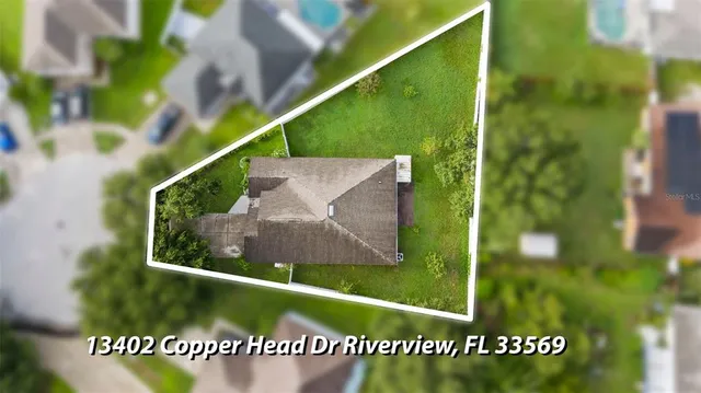 a view of swimming pool from a balcony