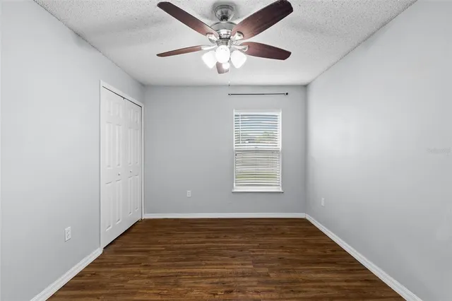 a bathroom with a bathtub and a window