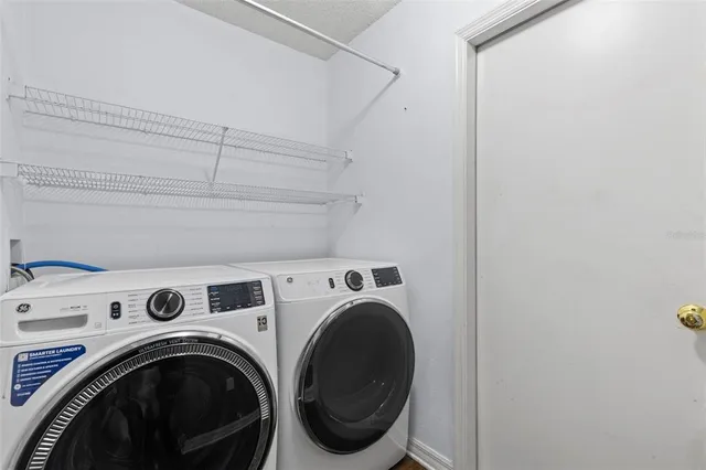 a view of an house with backyard space and garden