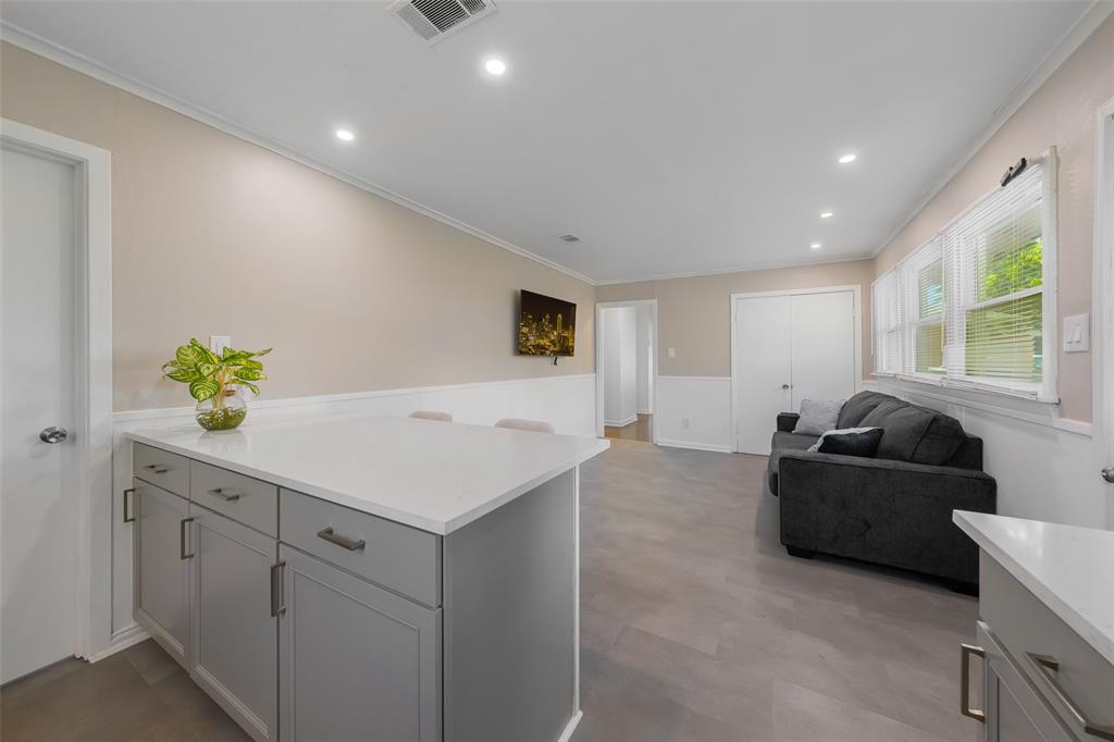 804 Haggard Street Plano, TX 75074 - Photo 18 of 40 a living room with furniture and a window