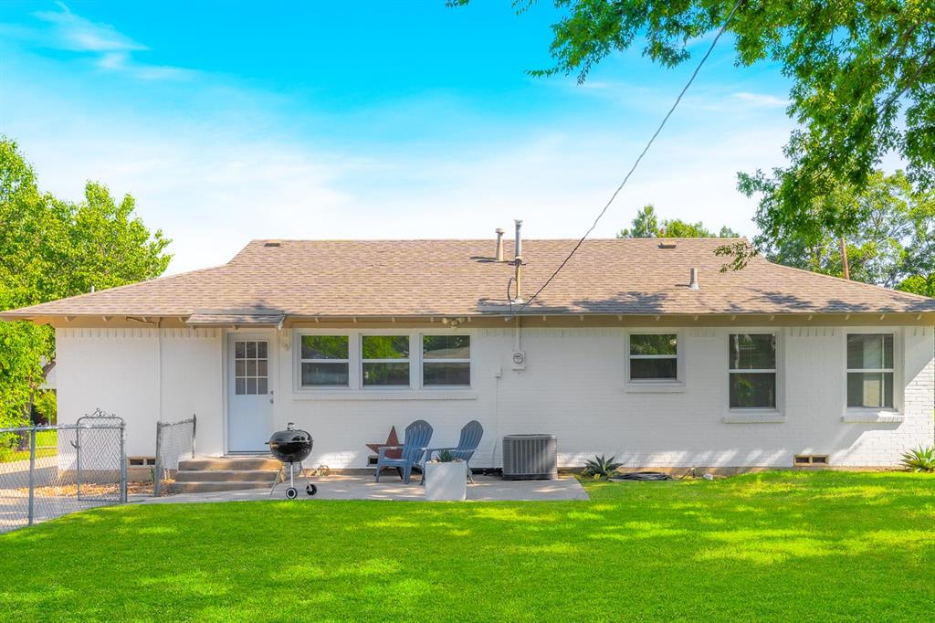804 Haggard Street Plano, TX 75074 - Photo 28 of 40 a front view of house with yard and seating area
