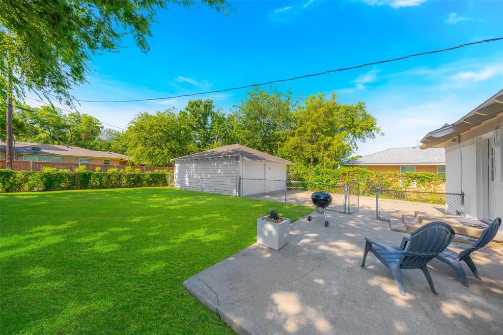 804 Haggard Street Plano, TX 75074 - Photo 29 of 40 a view of a patio with table and chairs and potted plants