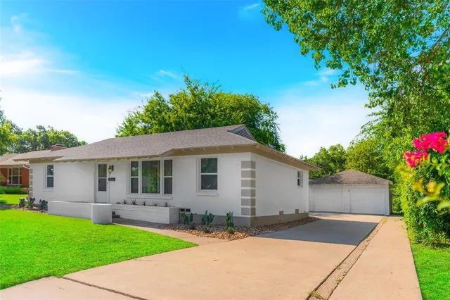 a backyard of a house with seating space