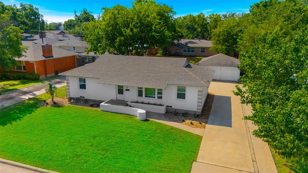 804 Haggard Street Plano, TX 75074 - Photo 34 of 40 an aerial view of a house with a garden and sitting area