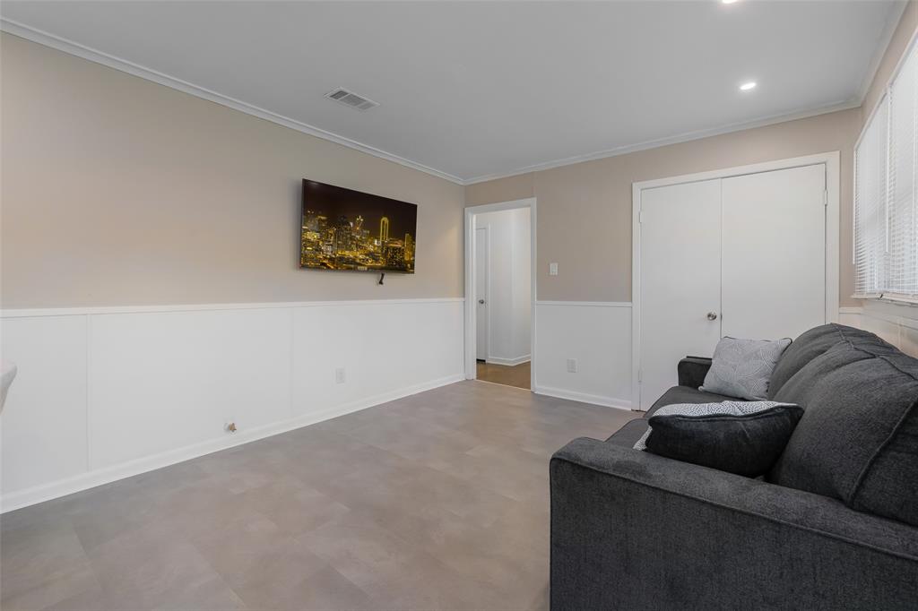 804 Haggard Street Plano, TX 75074 - Photo 9 of 40 a living room with furniture and a flat screen tv