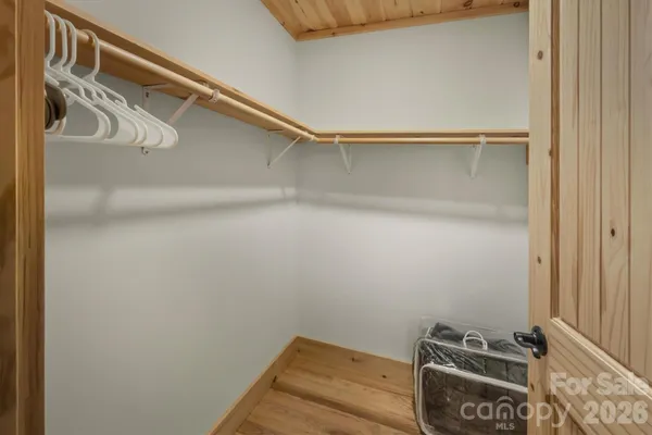 a room with furniture and wooden floor