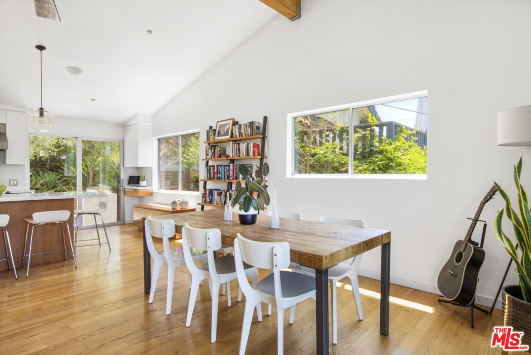 1423 Elevado Street Los Angeles, CA 90026 - Photo 16 of 51 a view of a dining room with furniture window and outside view