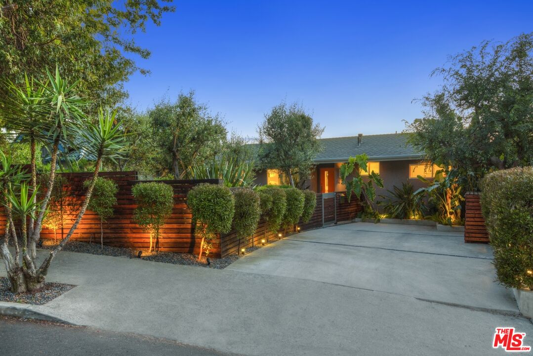 1423 Elevado Street Los Angeles, CA 90026 - Photo 2 of 51 a view of swimming pool with a patio