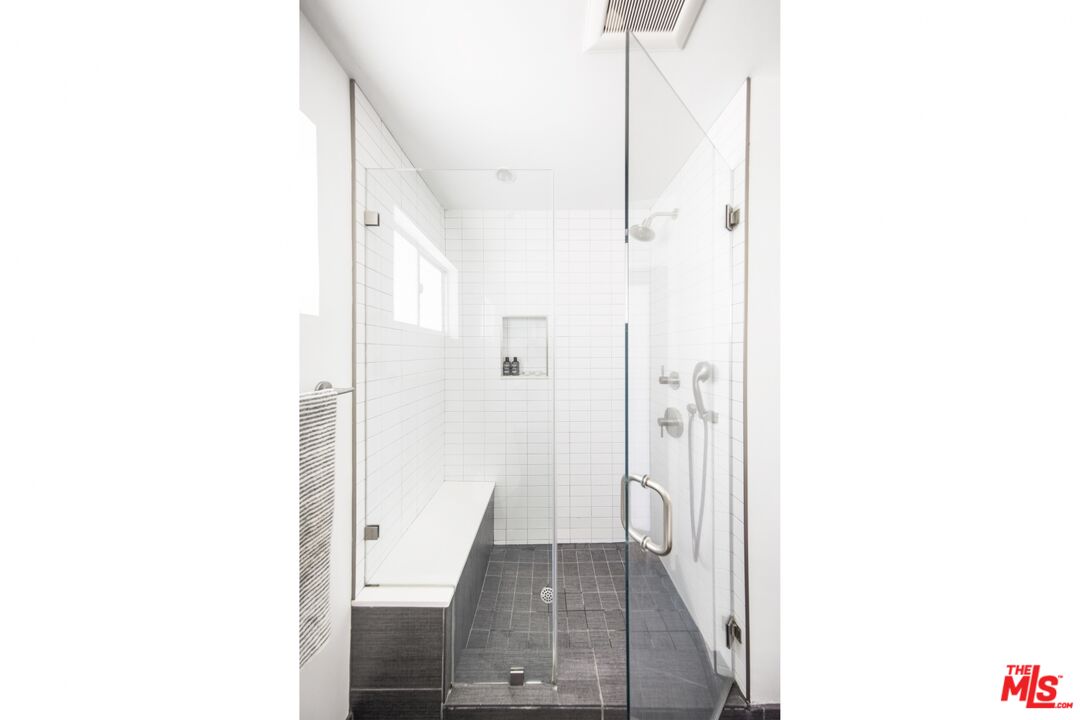 1423 Elevado Street Los Angeles, CA 90026 - Photo 27 of 51 a view of a hallway with wooden floor