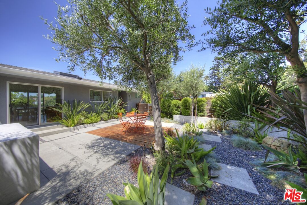1423 Elevado Street Los Angeles, CA 90026 - Photo 44 of 51 a view of backyard with plants and outdoor seating