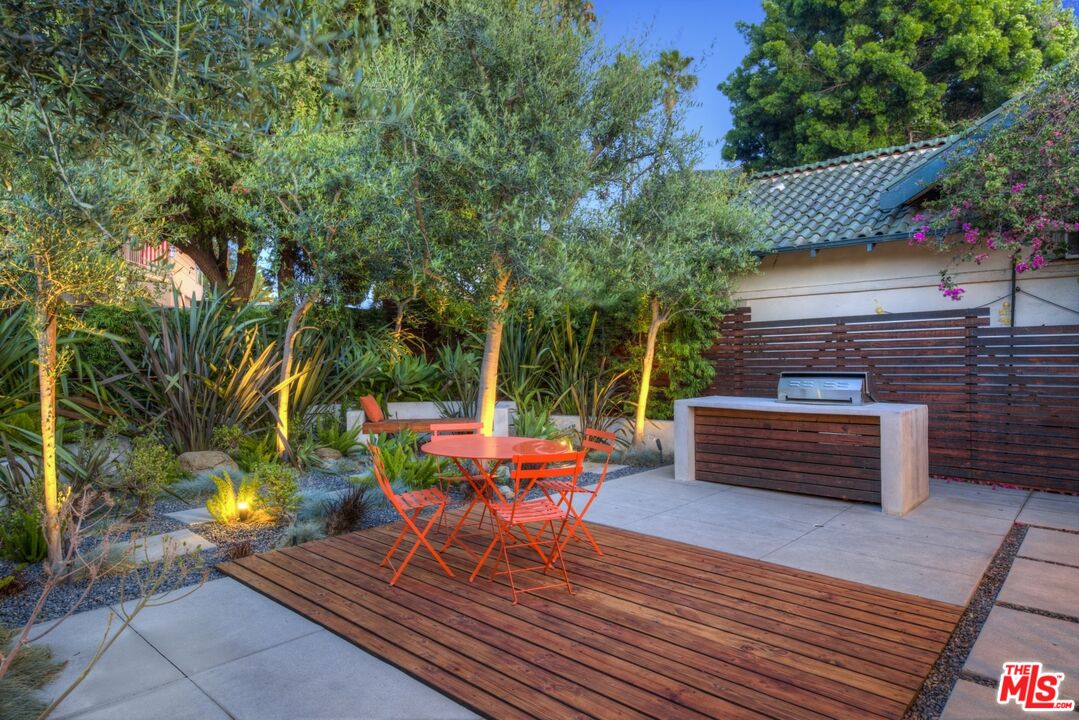 1423 Elevado Street Los Angeles, CA 90026 - Photo 5 of 51 a view of a bench in a patio
