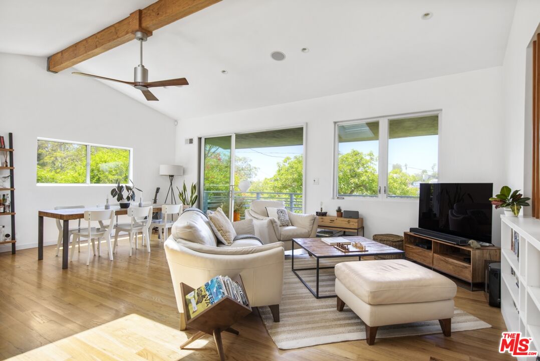 1423 Elevado Street Los Angeles, CA 90026 - Photo 7 of 51 a living room with furniture and a flat screen tv